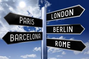 Signpost with 5 arrows - capital cities (London, Paris, Berlin, Barcelona, Rome) - great for topics like traveling, sightseeing etc.