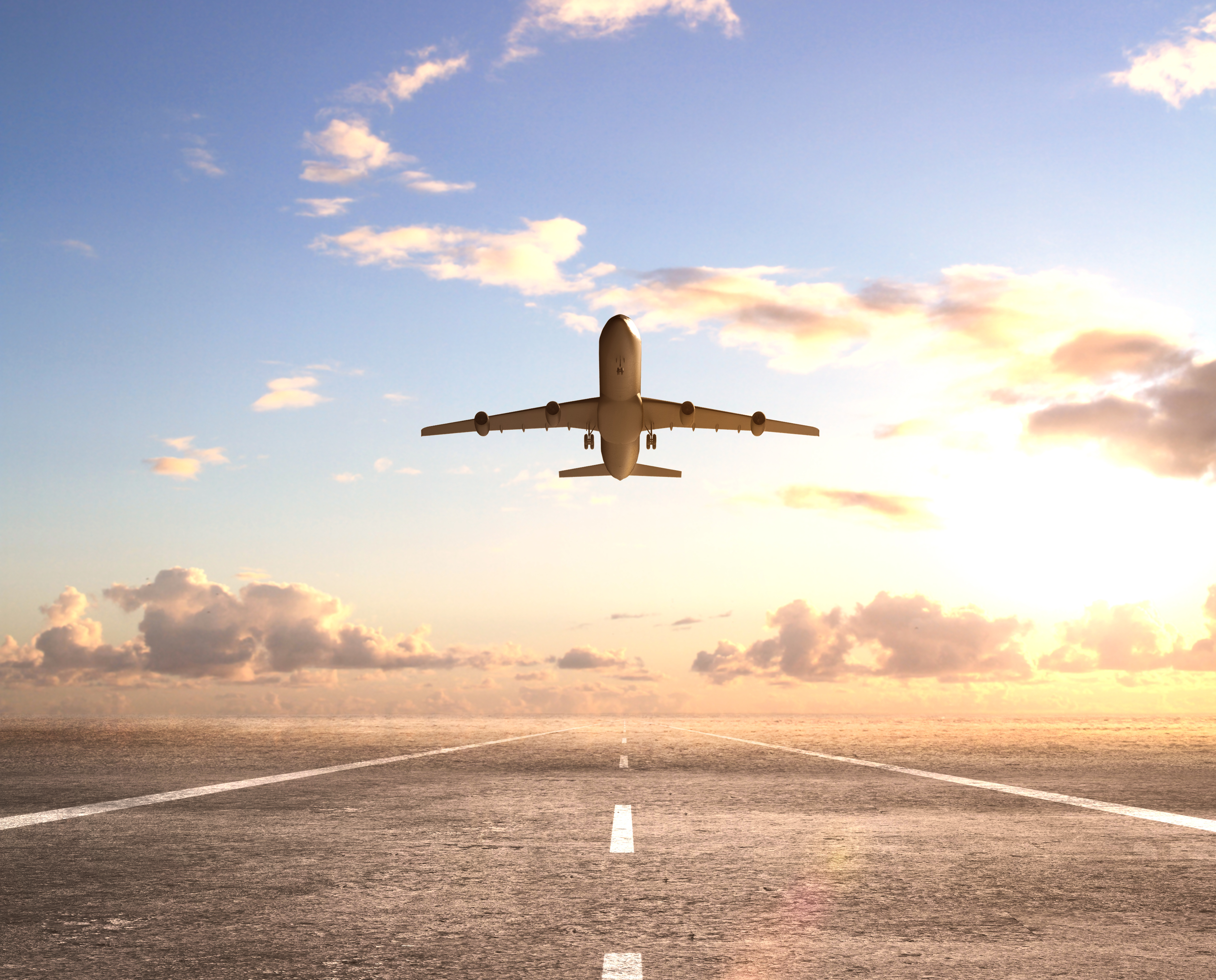 airplane on runway and looking at airplane in blue sky